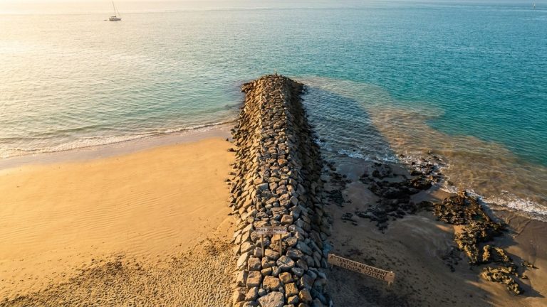 Coastal Resorts Install Breakwaters to Save Their Beach: What Disappeared Next Was Not the Shoreline or the Bay Floor