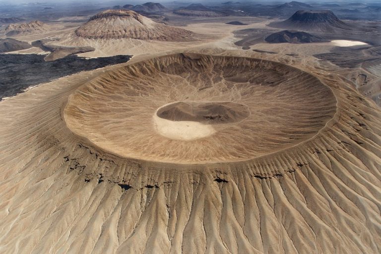 Millennia-Old White Domes in Saudi Arabia’s Black Lava Field